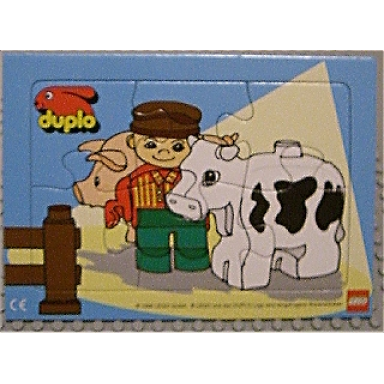 duplo puzzle with farmer and cow