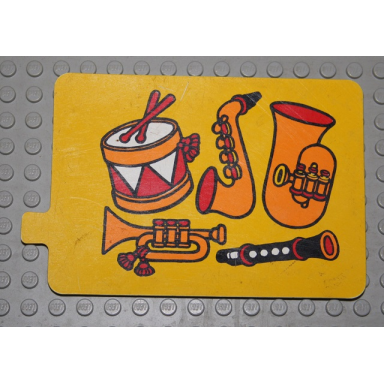 yellow duplo slide with musical instruments pattern