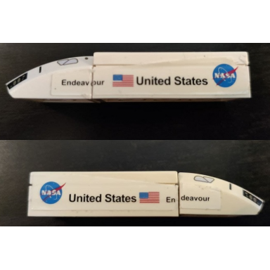 white stickered assembly 6 x 2 x 1 with endeavour united states flag and nasa logo pattern on both sides stickers - set 7467 - 1 slope curved 2 x 2 lip with space shuttle pattern 2 plate 2 x 4 2 tile 1 x 4